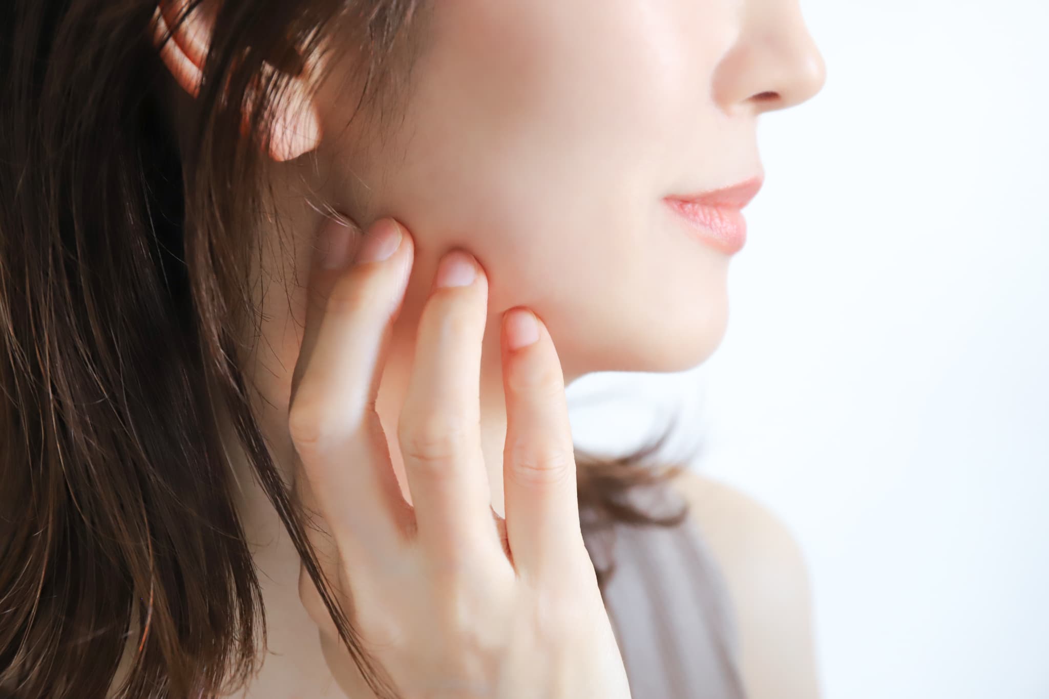 噛み合わせを気にする女性