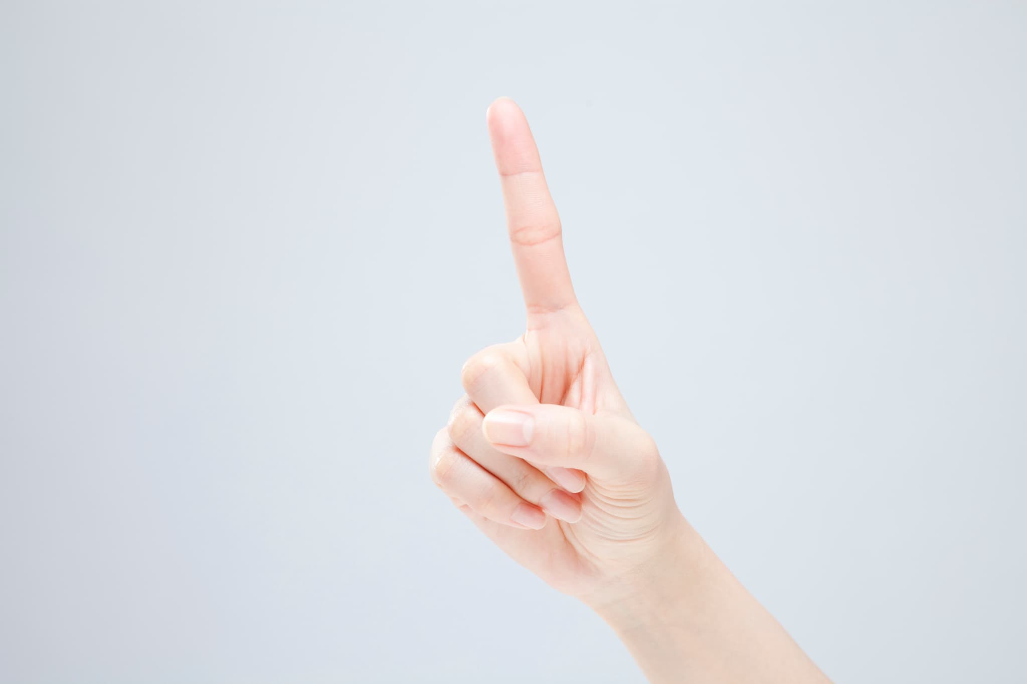 ポイントを伝える指先