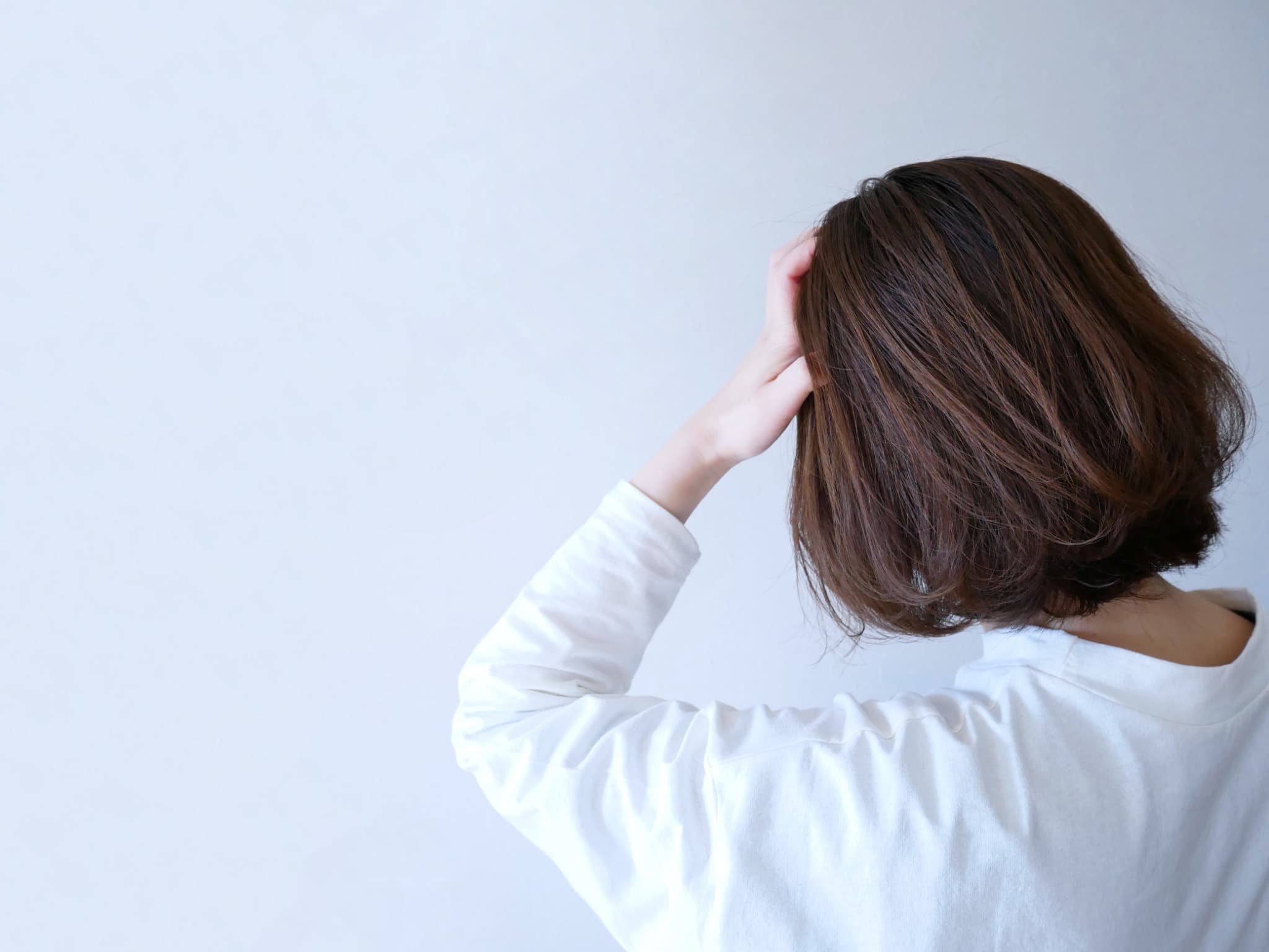 解決せずに悩む女性