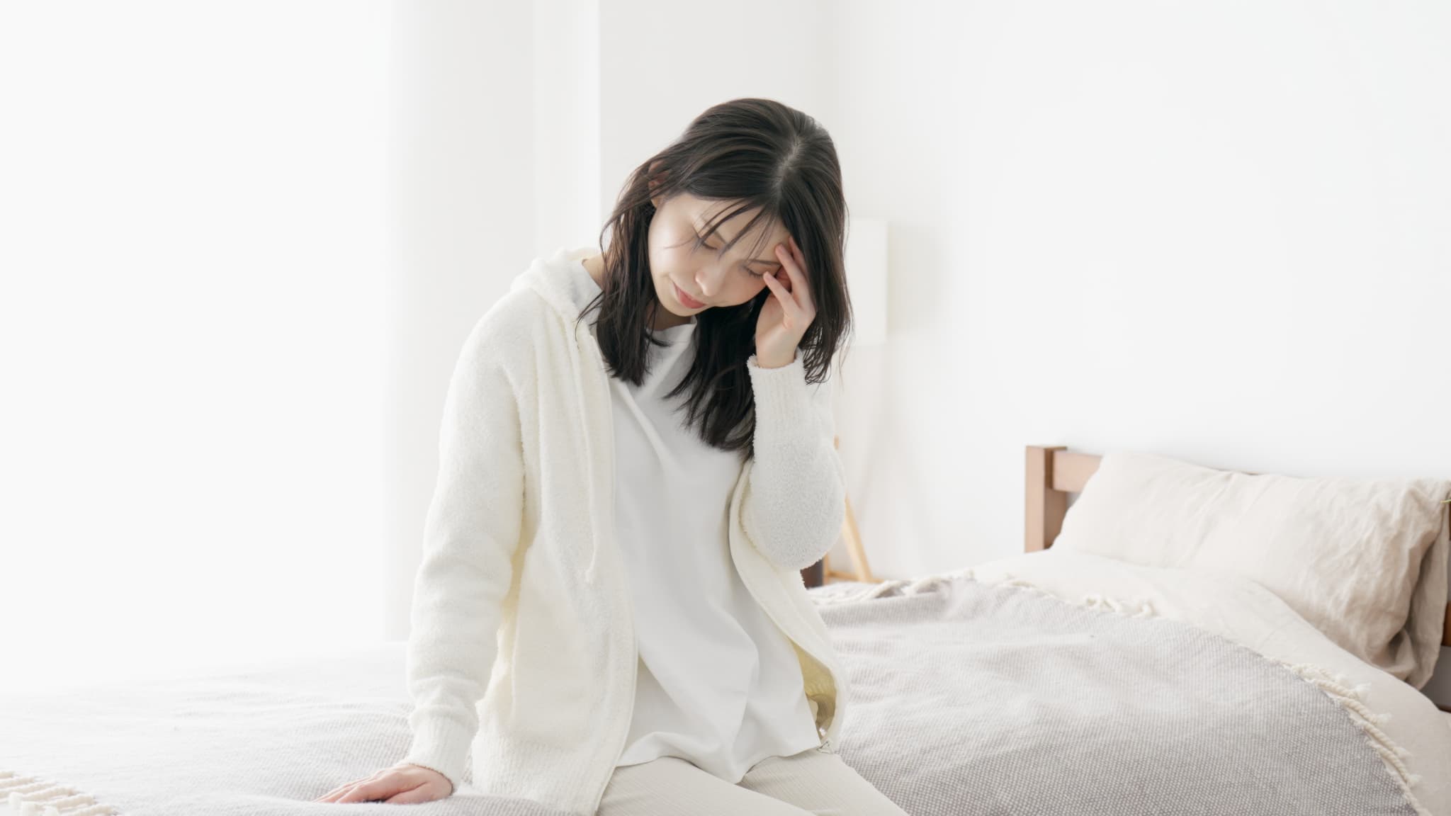 不調を感じる女性